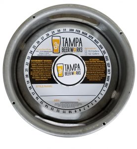2 color keg collar with adhesive printed for Tampa Beer Works placed on a sixth barrel keg