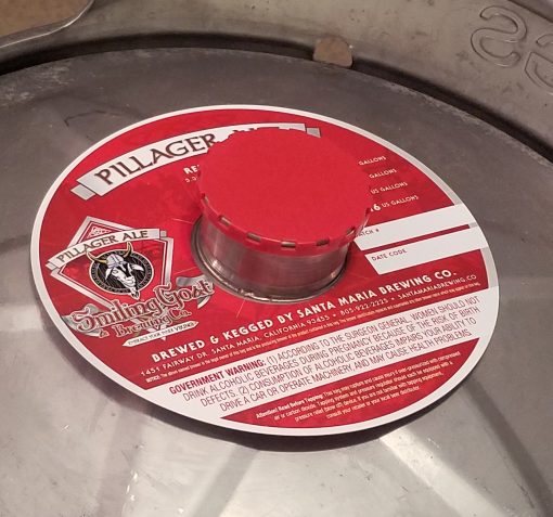 4 color digitally printed custom keg collar placed on a keg with red vented keg cap