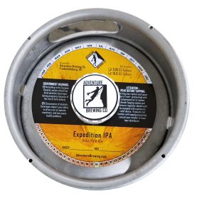 actual printed sample of a 4 color keg collar for Adventure Brewing placed on a sixth barrel