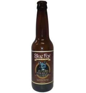 Irish Red 4 color label printed and placed on 12 oz. bottle for Blue Fox Brewing